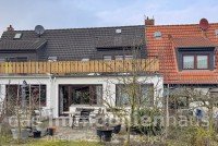 Bild (6a06baa1c567b7d638e75058021a086f): Kleines Reihenhaus in der Gartenstadt